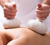 Thai herbal ball massage in NE Calgary